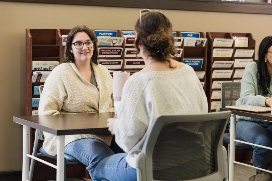 Advising at a table in the Career Center