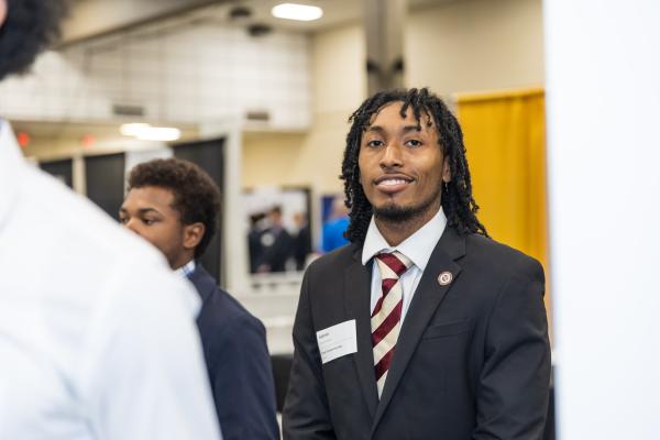 FSU student wearing business suit at career fair